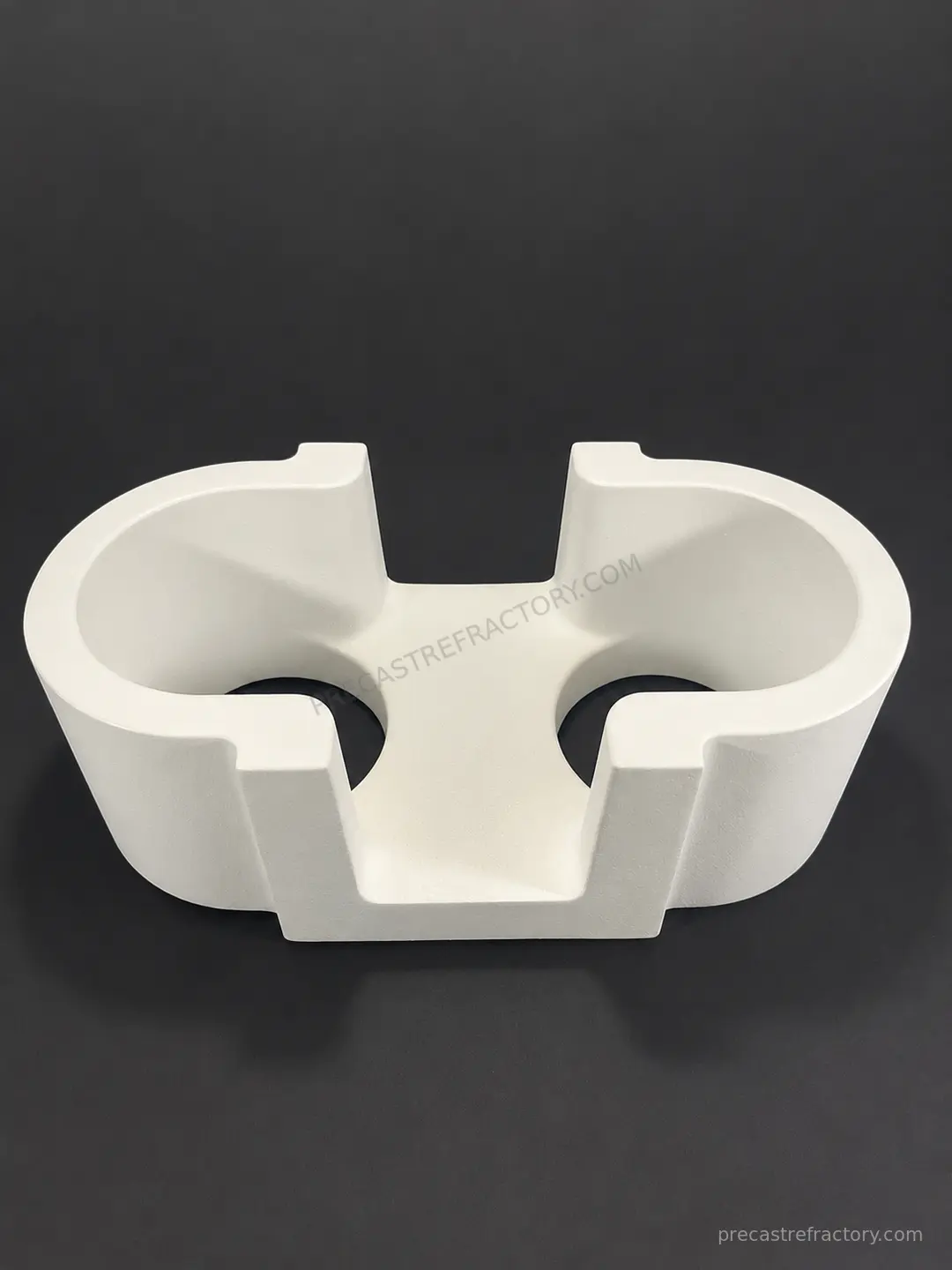 Precast refractory casting table interface component