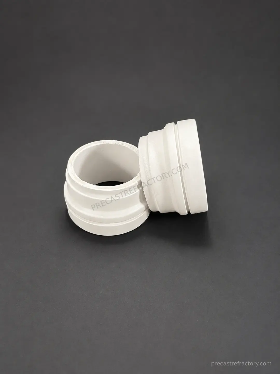 Precast refractory thimble for aluminium billet casting table